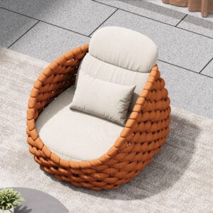 Relaxed outdoor lounge chair featuring a rust-resistant aluminum frame and plush cushion.