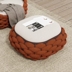 Relaxed modern outdoor storage ottoman features a cushioned lift-up seat for convenient storage.