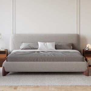 Soft tailored Curva gray linen platform bed features a rounded headboard and curved legs.