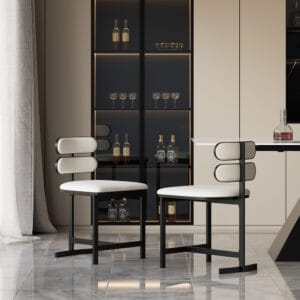 Modern faux leather dining chairs set of 4 with padded seats and metal legs.