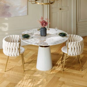 Round sintered stone dining set with a durable top and stylish leather-wrapped base.
