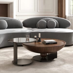Stylish walnut nesting coffee table set featuring tempered glass tops and textured steel legs.