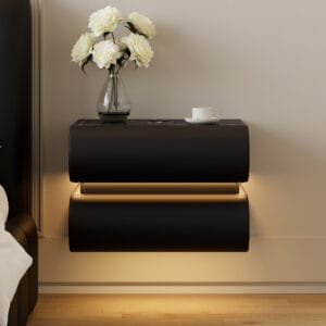 Sculptural floating leather nightstand with warm lighting and integrated charging feature.
