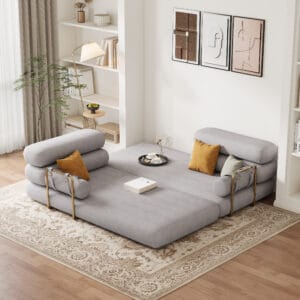 Comfortable king size gray velvet sleeper couch easily transforms from sofa to bed.
