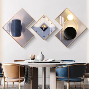 Three-piece geometric wall clock set featuring gold-finished frames and quiet quartz movements.