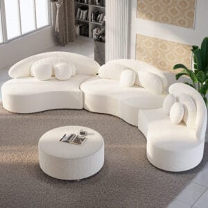 A modern living room featuring a modular curved sectional sofa designed for relaxed social living.
