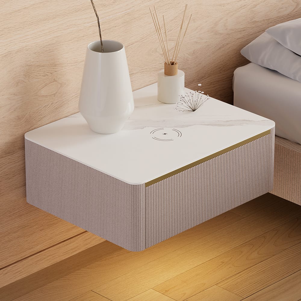 Sleek modern floating nightstand featuring a durable sintered stone top and faux leather finish.