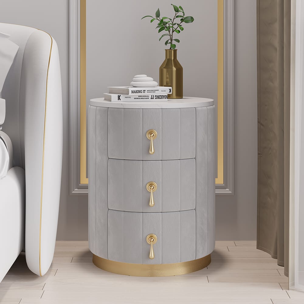 Stylish round nightstand with storage featuring a velvet finish and three spacious drawers.