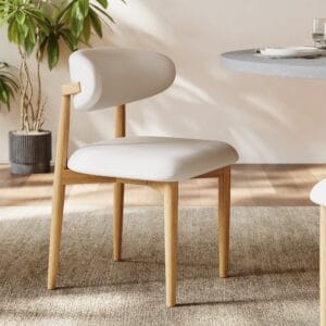 Ergonomic curved back modern dining chair with rubberwood frame and various upholstery options.