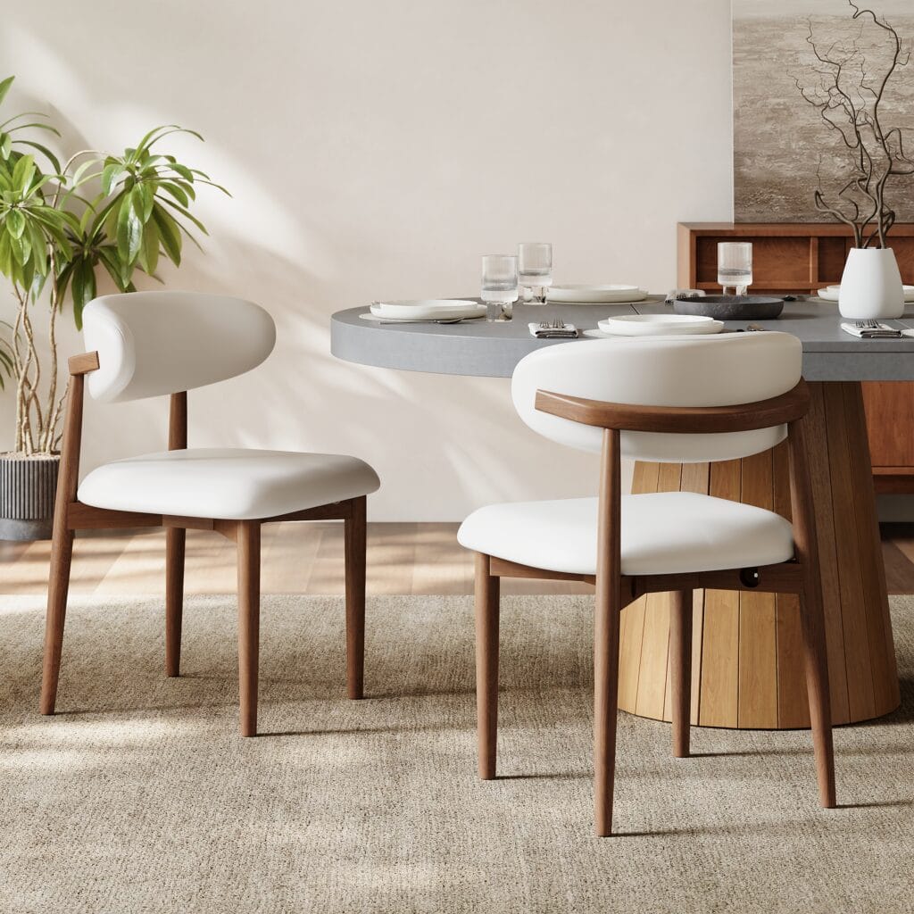 Modern dining chair set upholstered in PU leather with ergonomic curved back for support.