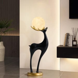 Sleek black deer design with golden antlers, showcasing the Modern Resin Deer Floor Lamp.