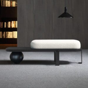 Sculptural entryway bench featuring soft boucle upholstery and a warm wood base.