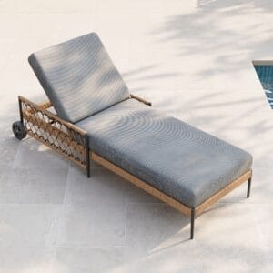 Stylishly designed outdoor lounge chair with wheels offering versatile reclining options and plush cushions.