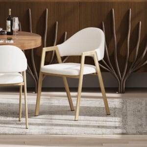 Comfortable boucle dining chair with padded seat and curved back, supported by metal legs.