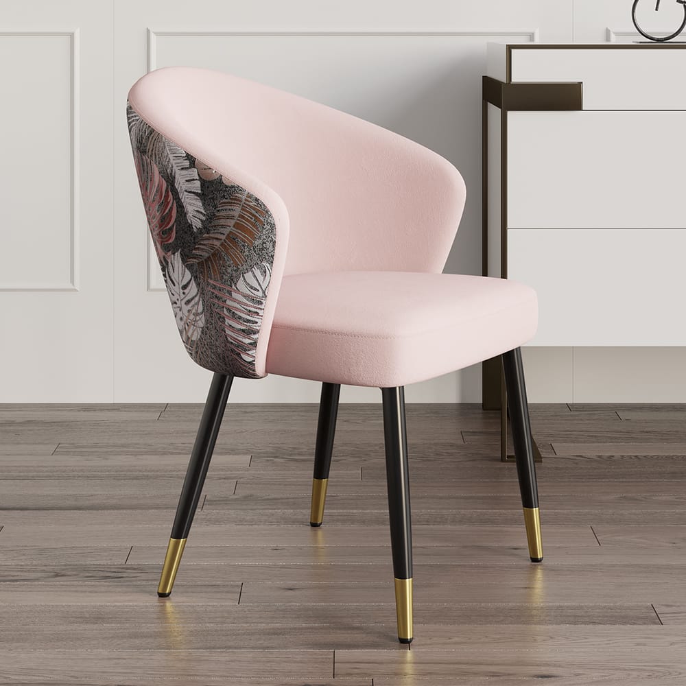 Stylish pink velvet dining chairs with cushioned seats and sturdy black and gold legs.