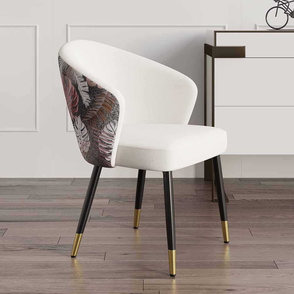 Stylish modern velvet dining chairs featuring cushioned seats and ergonomic backs for comfort.