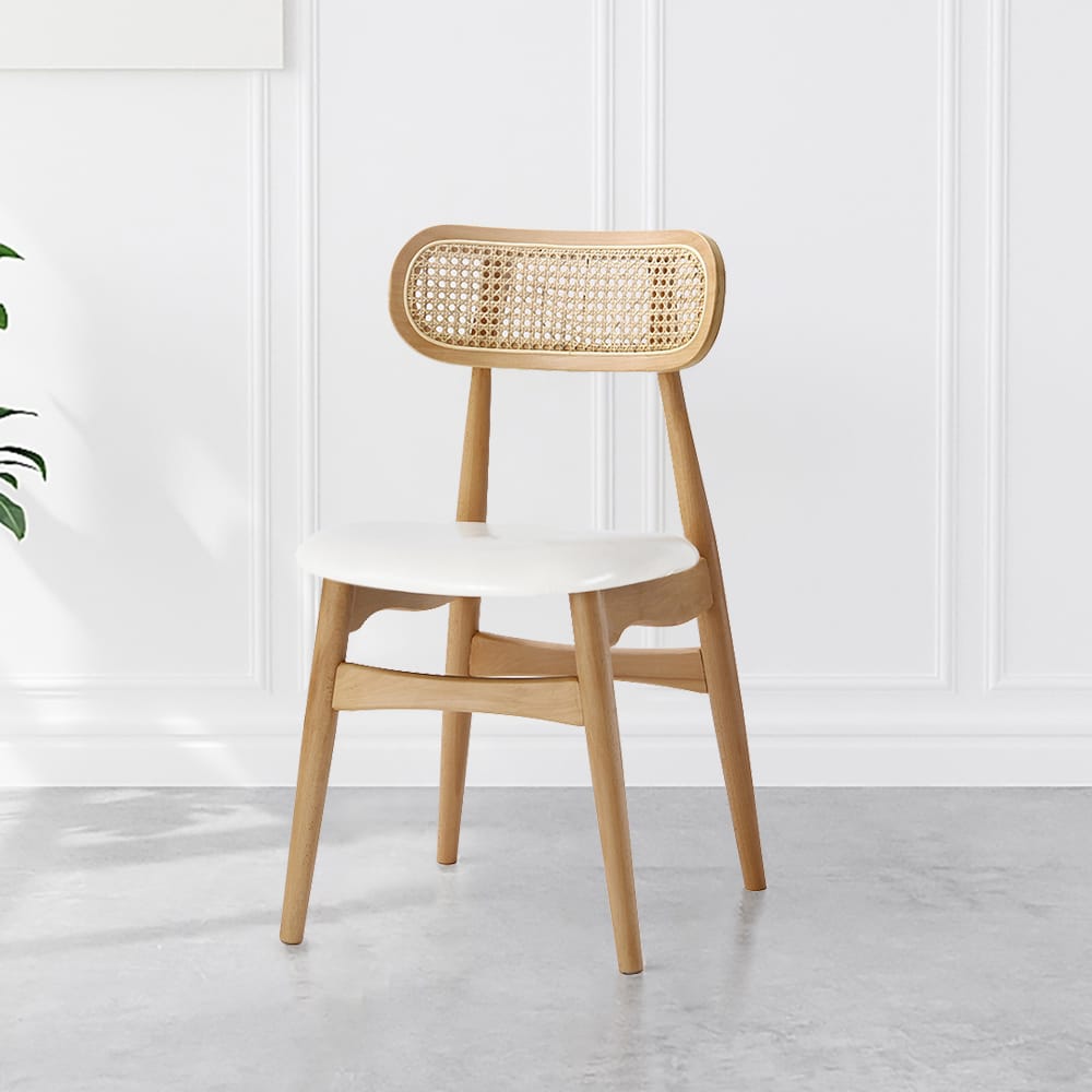 Japandi Dining Chairs Comfortable Natural 1 Comfortable Japandi Dining Chairs feature faux leather upholstery and a supportive ash wood frame.