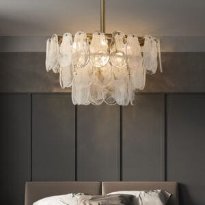 Elegant gold metal chandelier featuring geometric cloud glass for stunning light display.