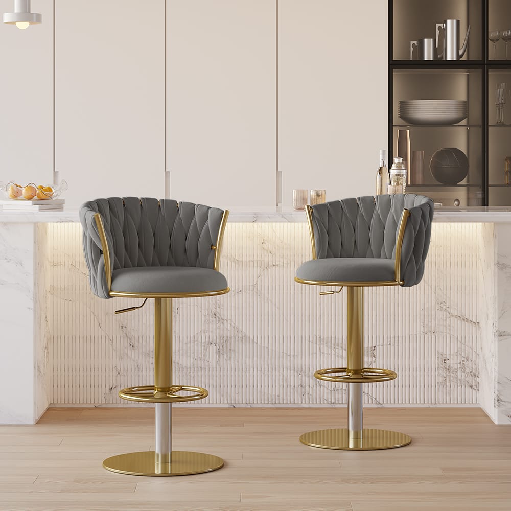 Comfortable gray swivel bar stools with full back and velvet upholstery for dining.