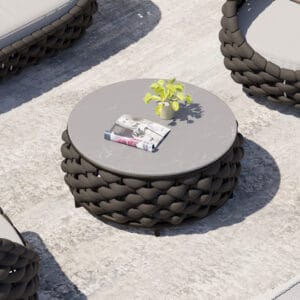Stylish round coffee table featuring a woven aluminum rope base and durable HPL Board top.