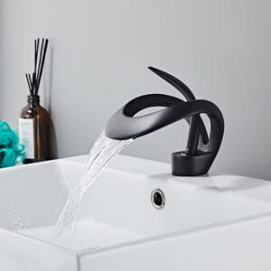 Sleek chrome finish black bathroom sink faucet with waterfall flow for contemporary bathrooms.