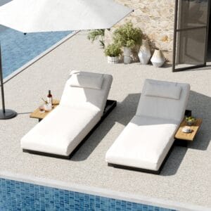 Sleek outdoor lounger daybed set featuring a modern black metal frame and neutral cushions.